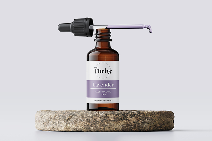 The Thrive Co. Essential Oils Bottle - Real Life Mockup